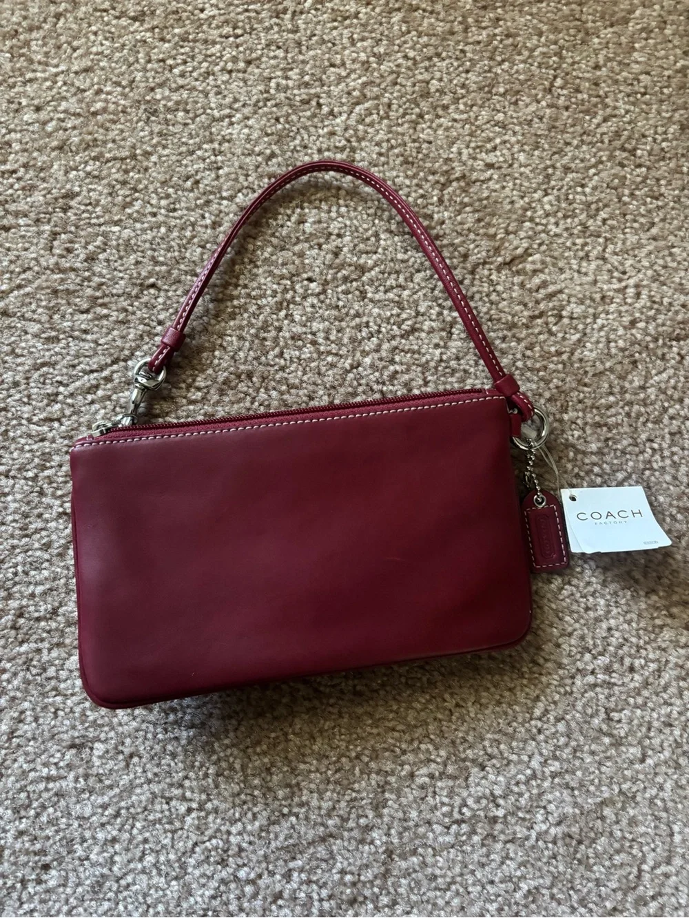 Coach Wine Red Leather Wristlet with Front Buckle Pocket